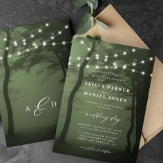 two wedding cards with string lights on them