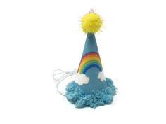 Cutest mini hat with a rainbow for the smallest members of your family - guaranteed to be the highlight of the party! Fit: The base is a little larger than the size of a quarter and comes with a delicate elastic chin strap that is adjustable. All of my hats have a sturdy card stock interior and are built to last! This hat will fit most small animals, such as chickens, hedgehogs, rabbits, ferrets, iguanas, etc. If you are unsure of the size, test-fit your pet with a quarter on the top of his head Fun Blue Hats For Gifts, Playful Blue Hat As A Gift, Playful Blue Hat As Gift, Fun Blue Hat For Gift, Fun Blue Adjustable Costume Hats And Headpieces, Playful Multicolor Costume Hats And Headpieces For Party, Playful Multicolor Hats For Gifts, Multicolor Playful Costume Hats For Party, Playful Adjustable Multicolor Costume Hats