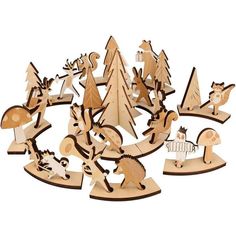 wooden cutouts of various animals and trees