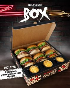 a box filled with lots of different types of sandwiches