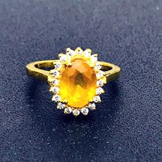 22 Carat Gold Plated Yellow Sapphire/Pukhraj Ring ,Handmade Ring Natural yellow Sapphire 3.5 Carat We accept Payment  through PayPal only, Whichis the Best and Safest gateway service  available in world. You can also pay using your credit card, via PayPal by  using PayPal as guest. Payment  should be made within 3 days of Purchase/Win the Item (s).                              Return  You can return  the Item (s) within 14 days of Item (s) receipt date. 100% satisfaction  Guaranteed. Return char Pushkaraj Stone Ring For Women, Yellow Oval Promise Ring, Yellow Halo Jewelry For Gifts, Yellow Oval Halo Jewelry, Yellow Citrine Gemstone Rings, Yellow Ring With Halo Setting, Yellow Halo Jewelry For Anniversary, Yellow Topaz Ring With Halo Setting For Anniversary, Yellow Halo Setting Rings For Anniversary