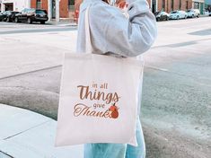 In All Things Thanks Fall Tote Bag, Pumpkin Tote Bag, Fall Shoulder Bag, Fall Outfits, Autumn Accessories, Eco Friendly Reusable Bag, by SimplyTotesBag on Etsy Daily Essentials, Reusable Bags, Environmental Impact