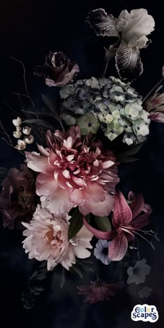 a bunch of flowers that are sitting on a black tablecloth with the words selfie written below it