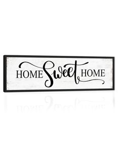 a black and white sign that says home sweet home with the word's in cursive writing