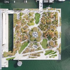 an aerial view of a park on the water