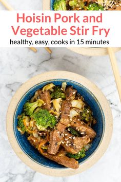 two bowls filled with meat and vegetables on top of a marble countertop next to chopsticks