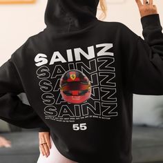 🏁 This Carlos Sainz-themed hoodie celebrates the unique style and Formula 1 success of the Ferrari driver, known as the "Smooth Operator." With its soft fabric and sleek design, it offers both comfort and style for everyday wear. Carrying the spirit of Ferrari in the world of Formula 1, this special piece is a perfect F1 hoodie for fans and Carlos Sainz supporters. If you're looking for a memorable Formula 1 gift or an exceptional addition to your F1 merch collection, this hoodie is the ideal choice! ◼ Carlos Sainz Top F1 Driver Hoodie F1 Merch Scuderia Formula One Hooded Sweatshirt Smooth Operator Fan Inspired Aesthetic Motorsport Clothing ◼ A unisex heavy blend hooded sweatshirt is relaxation itself. The material is a thick blend of cotton and polyester. This makes for a plush, soft fee Formula 1 Merch, F1 Hoodie, Motorsport Clothing, Merch Collection, Inspired Aesthetic, Sport Automobile, F1 Driver, Smooth Operator