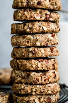 a stack of cookies sitting on top of a black plate