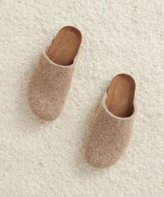 Cabin Moc Clog Taupe For those who love our collection of best-selling Moc Clogs, our newest felted wool edition offers a cozy, seasonal sensibility to an everyday classic. Featuring a felt wool upper, cork sole that molds to your feet, and suede footbed for ultimate comfort. Handmade in Portugal. | Handmade in Portugal. Fits true to size. If between sizes, we recommend sizing up. | Jenni Kayne Cabin Moc Clog Size 39 Portugal Fits, Wool Clogs, Clogs Style, Jenni Kayne, Felt Wool, Felted Wool, Charcoal Color, Mules Shoes, Wool Felt