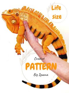 a hand holding an orange and black lizard on it's arm with the words crochet pattern written below