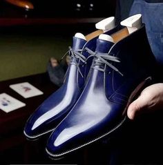 Handmade Navy Blue Color Genuine Leather Hand Painted Good Year Welted Lace Up Chukka Boots For men's ❤ Upper Material👉 Genuine Leather ❤ Inner Linings👉 Soft Leather ❤ Style👉 Chukka ❤ Color👉 Navy Blue ❤ Sole👉 Leather ❤ Gender👉 Male ❤ Heel👉 Leather ❤ Totally Hand stitched 👍 Manufacturing Time 7 to 10 Business Days Accessories may differ Sometime a little from original picture due to availability Colored rubber out sole extends durability and longevity of these striking men's dress shoes L Formal Blue Plain Toe Boots, Blue Plain Toe Boots For Formal Occasions, Formal Fitted Blue Boots, Blue Goodyear Welted Boots With Round Toe, Elegant Blue Formal Boots, Classic Blue Business Boots, Elegant Blue Boots For Formal Occasions, Classic Blue Plain Toe Boots, Classic Blue Boots For Business