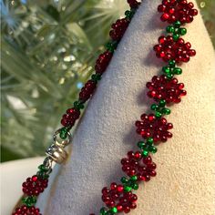 Get Into The Christmas Spirit With This Beautiful Green And Red Beaded Bracelet From Mooey Bracelets. Handmade In The United States, This Stackable Bracelet Is Perfect For Adding A Festive Touch To Any Outfit. The Beads Are Made Of High-Quality Czechoslovakian Glass And Feature A Charming Beaded Design. This Bracelet Is Ideal For Holiday Occasions And Can Be Worn As A Statement Piece Or Combined With Other Bracelets For A Chic, Trendy Look. The Bracelet Is New Without Tags And Contains No Signs Christmas Necklace Beaded, Red Jewelry For Holiday Jewelry Making, Christmas Party Beaded Necklaces With Round Beads, Christmas Party Round Bead Necklaces, Red Jewelry For Christmas Holiday, Red Beaded Bracelets With 8mm Beads For Gift, Red Beaded Bracelets With 8mm Beads As A Gift, Handmade Red Beaded Necklaces For Christmas, Red Round Beads Jewelry For Christmas