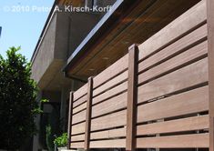 the side of a house with wood slats