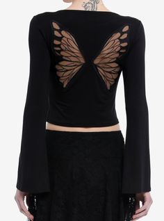 Flutter into your dark fairy era in this black top! It has a cropped fit and features a butterfly embroidered at the chest and a mesh butterfly design on the back. Complete with bell sleeves.95% rayon; 5% spandexWash cold; dry flatStretchy materialLength: 17''ImportedListed in junior sizesModel is 5'10''Model wears size Small Fairy Core Tops, Bat Wing Shirt, Aura Butterfly, Pixie Hallow, Butterfly Stuff, Cosmic Aura, Butterfly Shirt, Birthday Stuff, Fashion Vocabulary