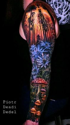 a man's arm with an image of mushrooms and trees in the forest on it