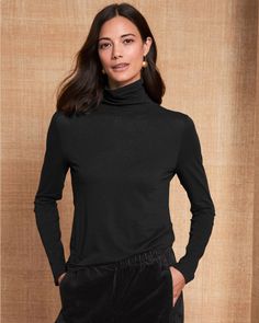 A fitted foundational turtleneck, to layer easily under sweaters, cardigans, and jackets. Its lightweight knit features a blend of sustainable TENCEL™ Lyocell and organic cotton with a whisper of perfect-fit stretch.  By EILEEN FISHER. Turtleneck. Long sleeves. Eileen Fisher, Knit Top, Perfect Fit, Topshop, Organic Cotton, Turtle Neck, Tops & Tees, Long Sleeve, Knitting