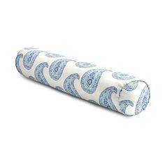 a blue and white rolled up pillow on a white background