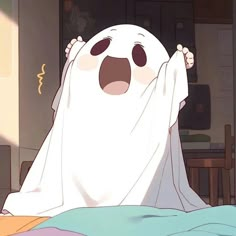 a ghost with its mouth open and hands in the air, standing on top of a bed