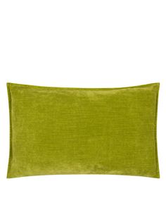 a green pillow on a white background