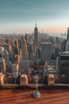 a view of the city from top of a building