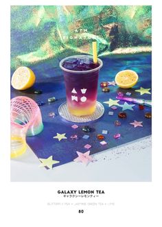 an advertisement for galaxy lemon tea on the side of a table with stars and confetti