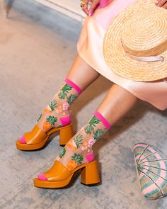 Perfect for your next vacation, our Tropical Pineapples Sheer Crew Sock features color blocked pineapples in pink and orange interspersed with Hawaiian leaves. These cheerful pineapple socks will have you on island mode in no time! This item is final sale. One Size. Recommended fit US W5.5-10. 200 Needle Count. ✨ Funky yet elegant - no silly or childish patterns 🧦 Premium quality - durably made with comfortable stretch 👗 Unique - the perfect accessory to add individuality to your outfits Trendy Orange Socks For Spring, Fun Multicolor Summer Socks, Playful Pink Summer Socks, Playful Yellow Socks For Summer, Fun Pink Socks For Summer, Trendy Yellow Summer Socks, Casual Pink Socks For Summer, Sock Candy, Hawaiian Leaves