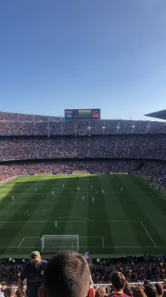 a soccer stadium filled with lots of people