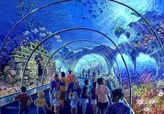 people are walking through an underwater tunnel with corals and other marine life in the background