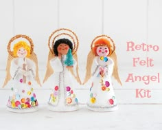 three angel figurines made out of felt and beads with the words retro felt angel kit