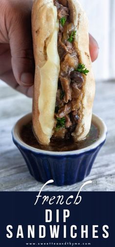 a hand holding a sandwich over a bowl of soup with the words french dip sandwiches on it