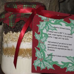 a christmas cookie mix in a jar with a red ribbon around it and a poem on the label