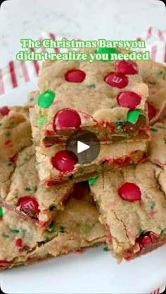 christmas bars are stacked on top of each other with candy and sprinkles