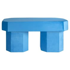 a blue bench sitting on top of a white floor