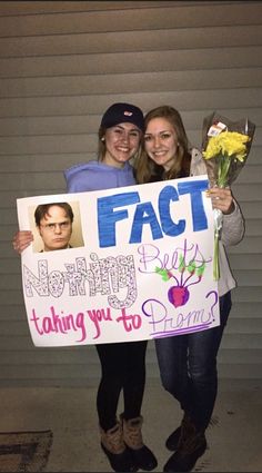 two women holding a sign that says fact nothing but taking you to proms?