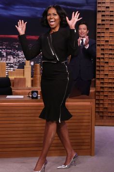 opi on the tonight show wearing a black dress with zippers and silver heels