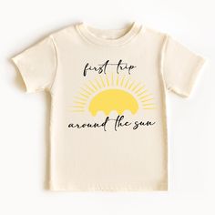 Celebrate your little one's 1st birthday in style with this adorable sun shirt! Perfect for a fun and sunny birthday party, this shirt features a cheerful design that will make your little one stand out. Made with soft and breathable fabric, this shirt is both cute and comfortable for your baby to wear all day long. Add a special touch to your little one's birthday celebration with this 1st birthday sun shirt! + Machine washable & dryer safe (I recommend drying on delicate) + Design color will d Summer Playtime Tops With Letter Print, Summer Graphic Print T-shirt For Playtime, Summer Fun Playtime Shirt, Fun Summer Playtime Shirt, Playful Summer Shirt For Playtime, Summer Graphic Tee For Playtime, Graphic Tee For Summer Playtime, Graphic Tee T-shirt For Summer Playtime, Casual Summer Shirt For First Birthday