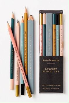 several pencils are lined up next to each other on a white surface with the title kaalenanon luxury pencil set