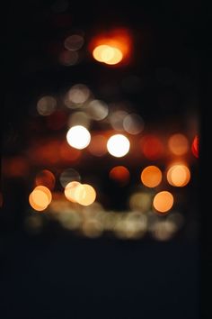 blurry image of street lights in the dark