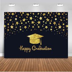 a graduation backdrop with gold stars and a graduate cap on the front, happy graduation