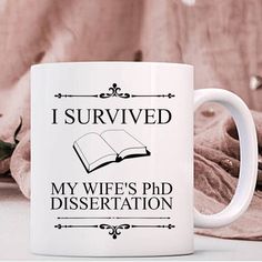 a coffee mug that says i survived my wife's pdi dissection