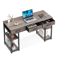 a laptop computer sitting on top of a wooden desk