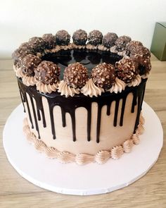 a cake with chocolate icing and drizzled on top