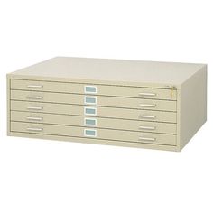 an empty file cabinet with five drawers