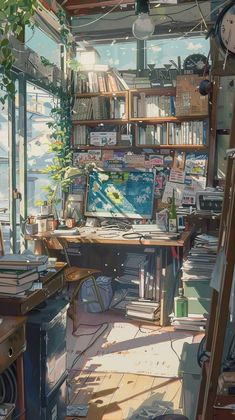 an artist's work space with bookshelves, desk and computer on it