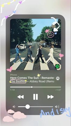 an image of the beatles album being viewed on a cell phone