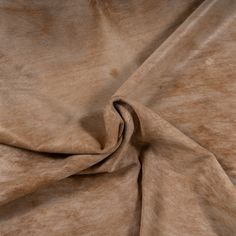 a close up view of a brown fabric