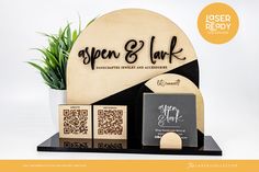 an open and park sign next to two wooden blocks with qr code on them