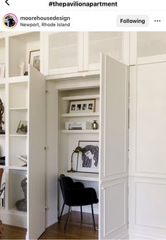 an open bookcase in the corner of a room