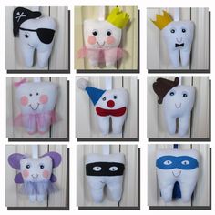 toothbrush holders made to look like cartoon characters are hanging on the wall in different styles and colors