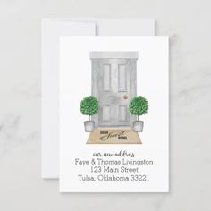 a white card with an illustration of a front door and potted plants on it